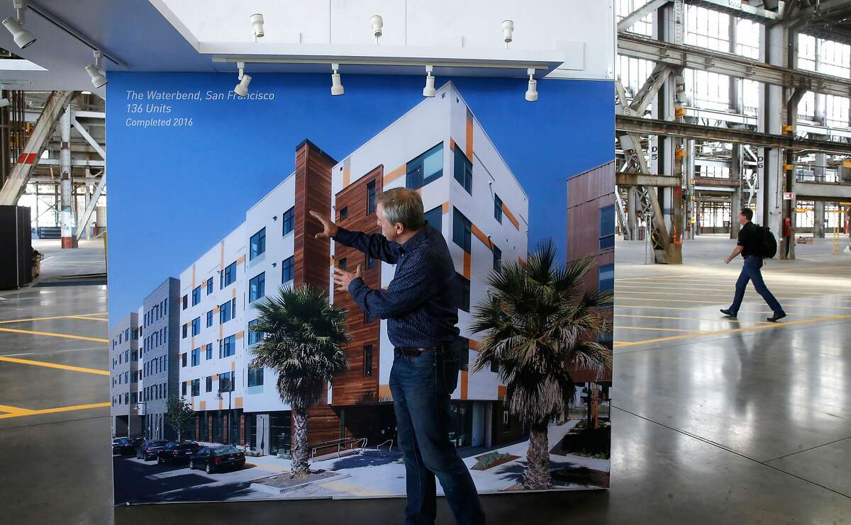 CEO Rick Holiday explains how they constructed the Waterbend complex in San Francisco completed in 2016. Displayed inside the huge building at Factory_OS, where they are ramping up to build well-designed, tech-ready multifamily homes 40% faster and 20% less expensive than conventional housing on the grounds of the famous Mare Island Naval Shipyard in Vallejo, Ca., as seen on Mon. September 11, 2017.