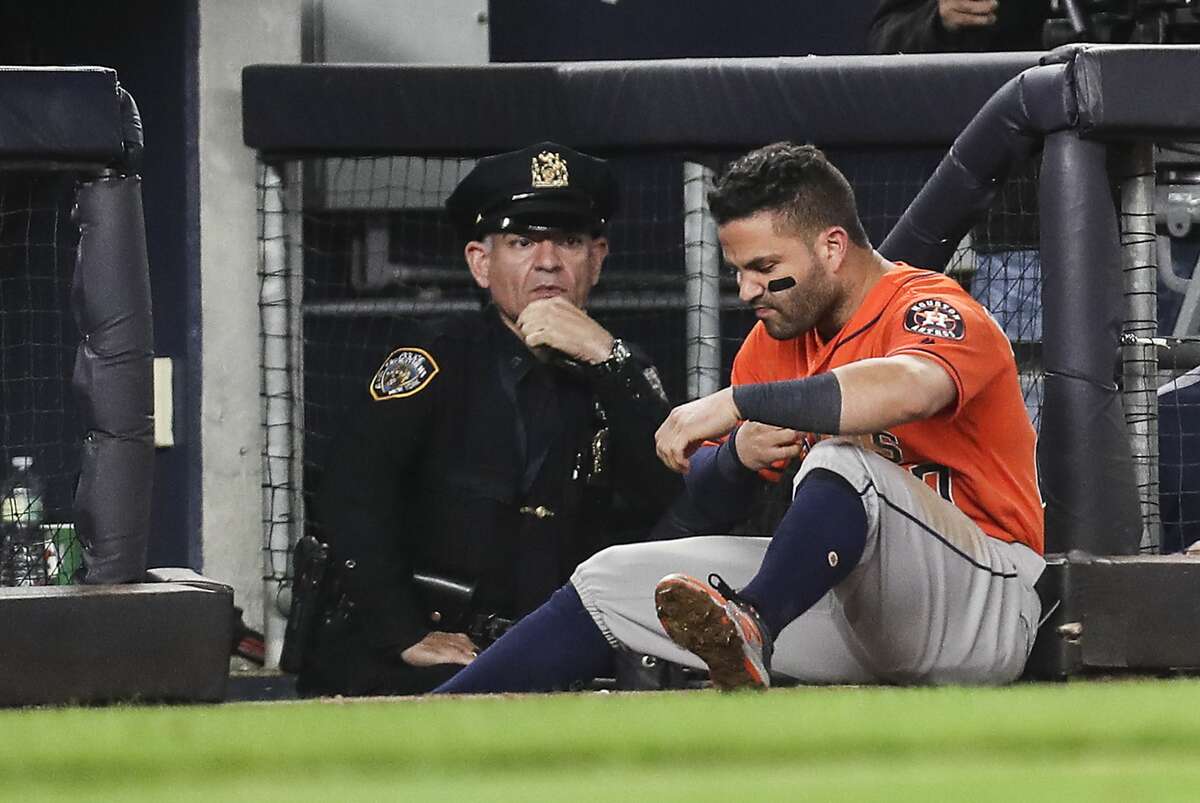 Houston Astros second baseman Jose Altuve sits at the end of the dugout after flying out during the top half of the ninth inning of Game 5 of the ALCS against the New York Yankees at Yankee Stadium on Wednesday, Oct. 18, 2017, in New York. The Yankees beat the Astros 5-0 to take a 3-2 lead in the best-of-seven series. ( Michael Ciaglo / Houston Chronicle )