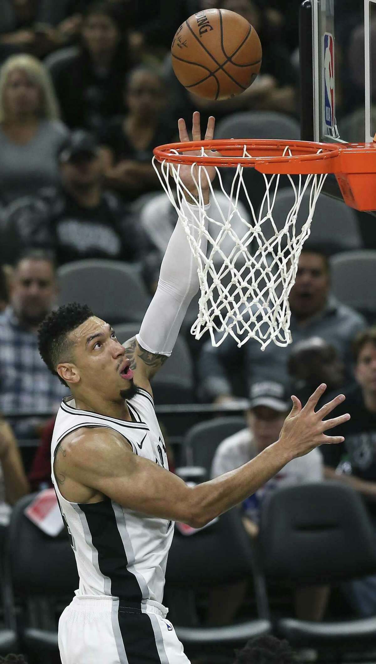 Spurs guard Danny Green gets to the hoop as the Spurs play Minnesota in the season opener on Oct. 18.