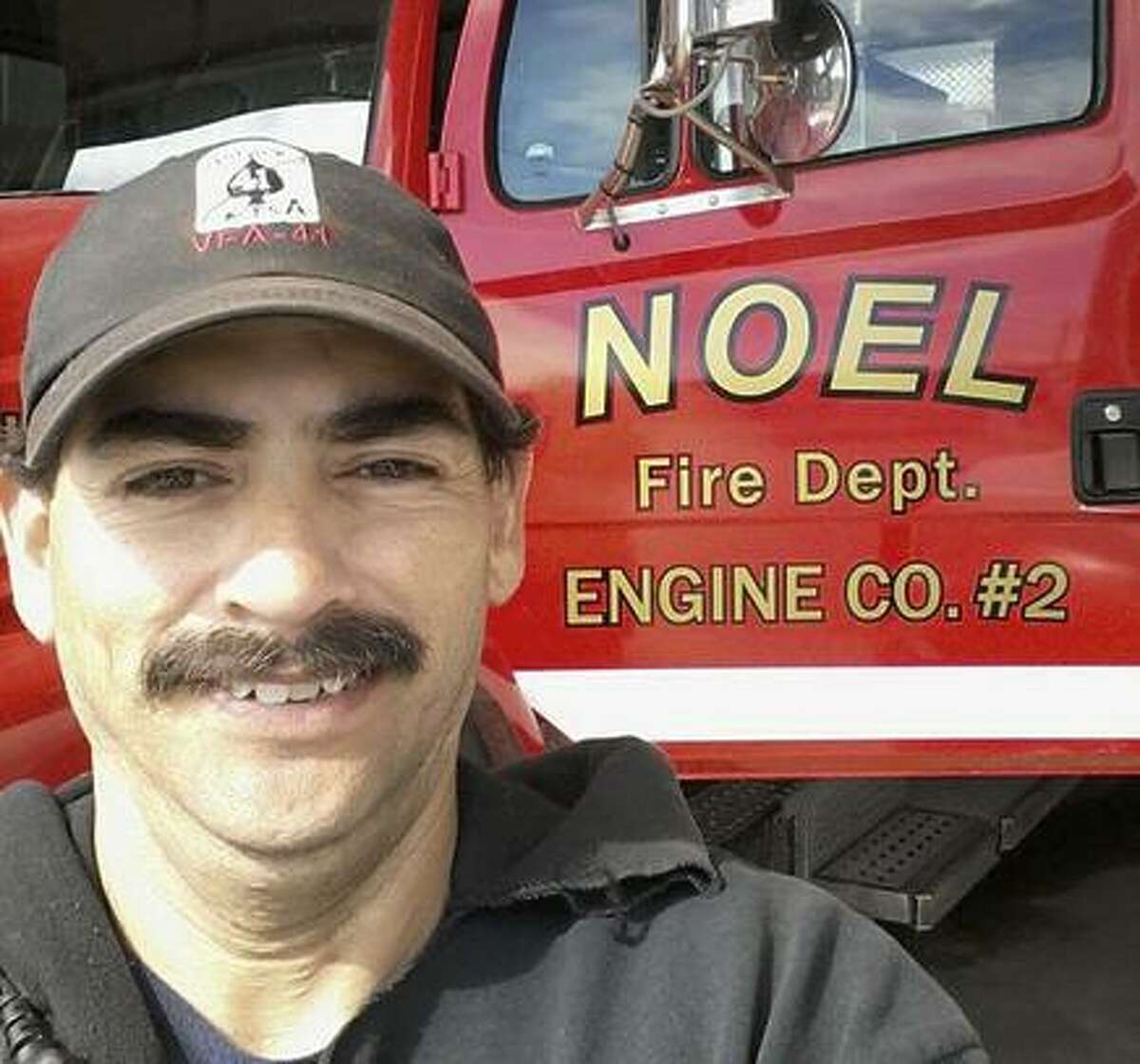 Firefighter Garrett Paiz, 38, died when truck ran off road.