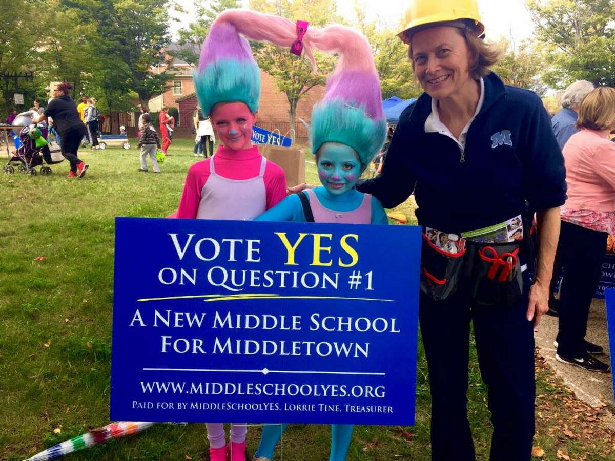 Middletown School Yes supporters set up a table on Main Street as part of the city’s Halloween trick or treat event Saturday.