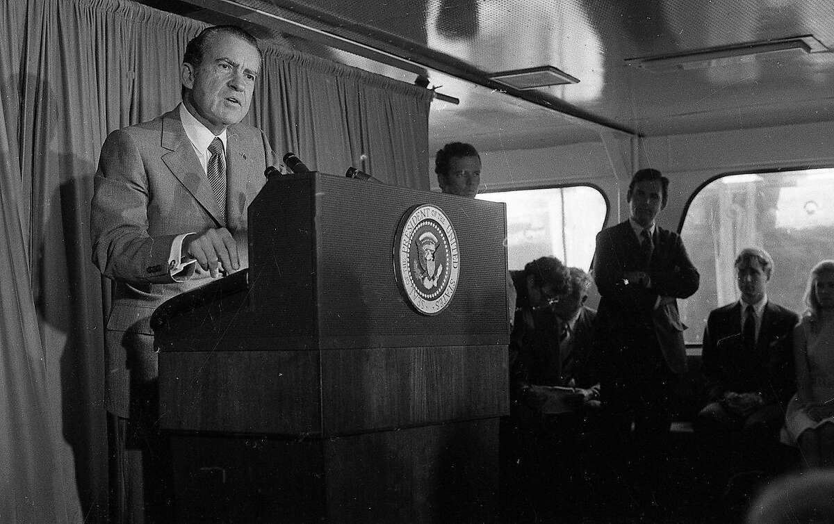 President Richard Nixon addresses a group of journalists and politicians on board a ferry boat in San Francisco Bay on Sept. 5, 1972.