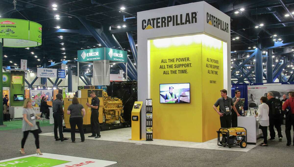 Caterpillar displays rental generators at the International Facility Management Association convention.﻿