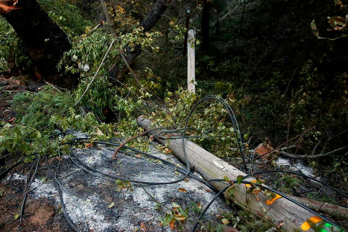 A fallen power pole along Nuns Canyon rd. in Glen Ellen, Ca. as seen on Tuesday October 17, 2017.
