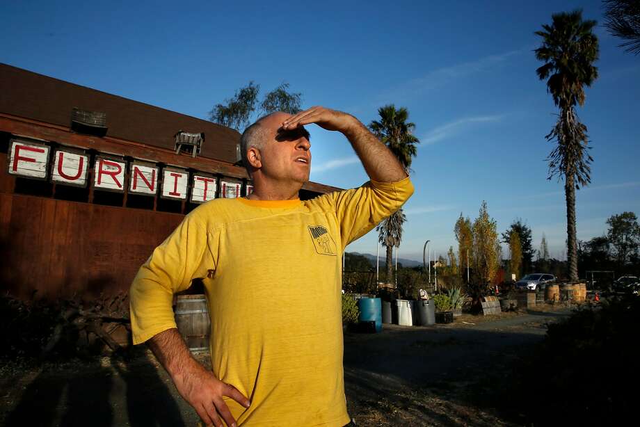 Paul Block, owner of Wine Barrel Furniture in Calistoga, Ca., on Tuesday October 17, 2017, looks towards the path of the Tubbs fire across from his property. Block stayed put as the fire eventually burned around his place. Photo: Michael Macor, The Chronicle