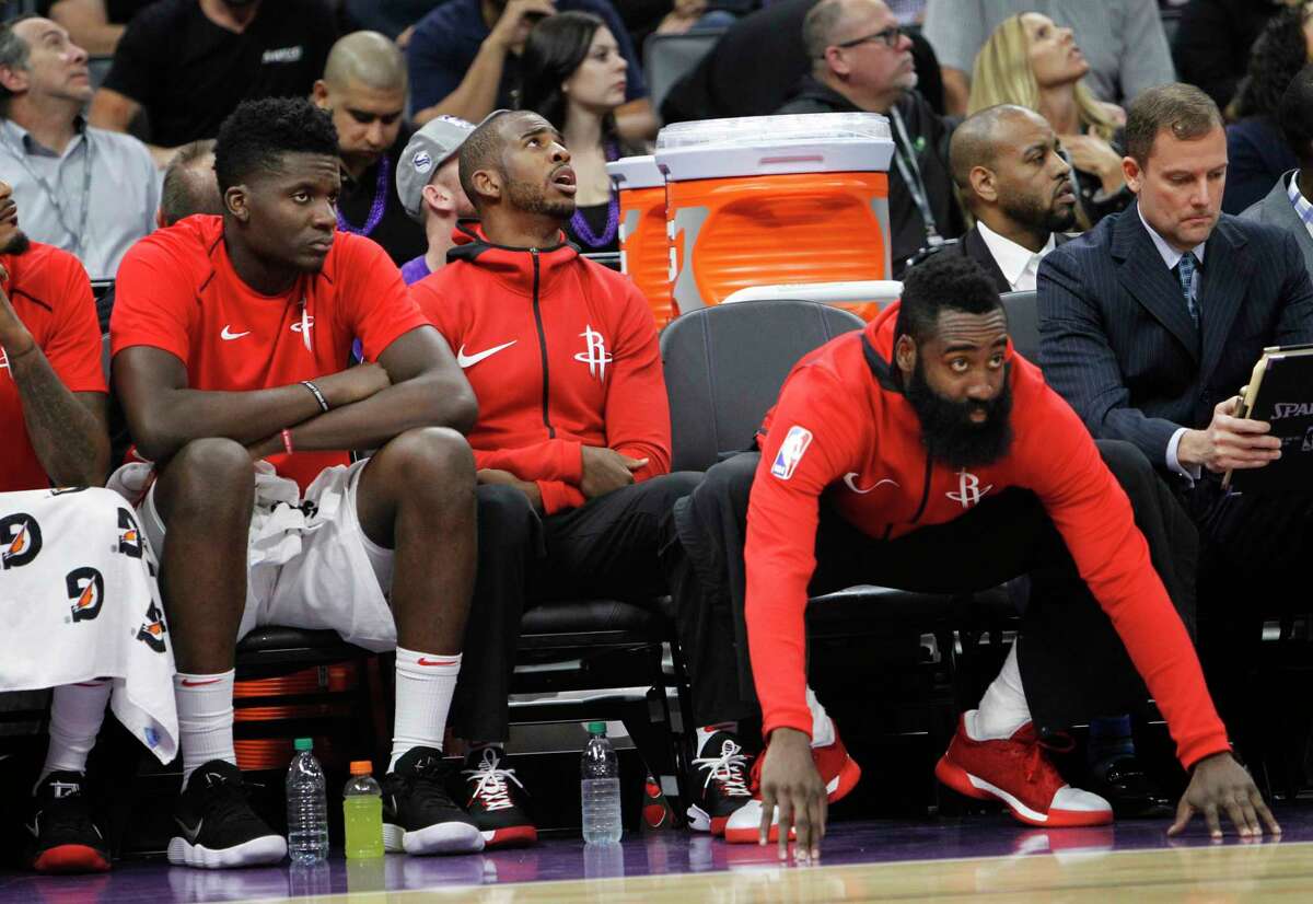 The integration of guard Chris Paul, right, into the system has been slowed by his bruised knee - he didn't play in the second game. But center Clint Capela, left, helped make for his absence with 22 points and 17 rebounds against the Kings.