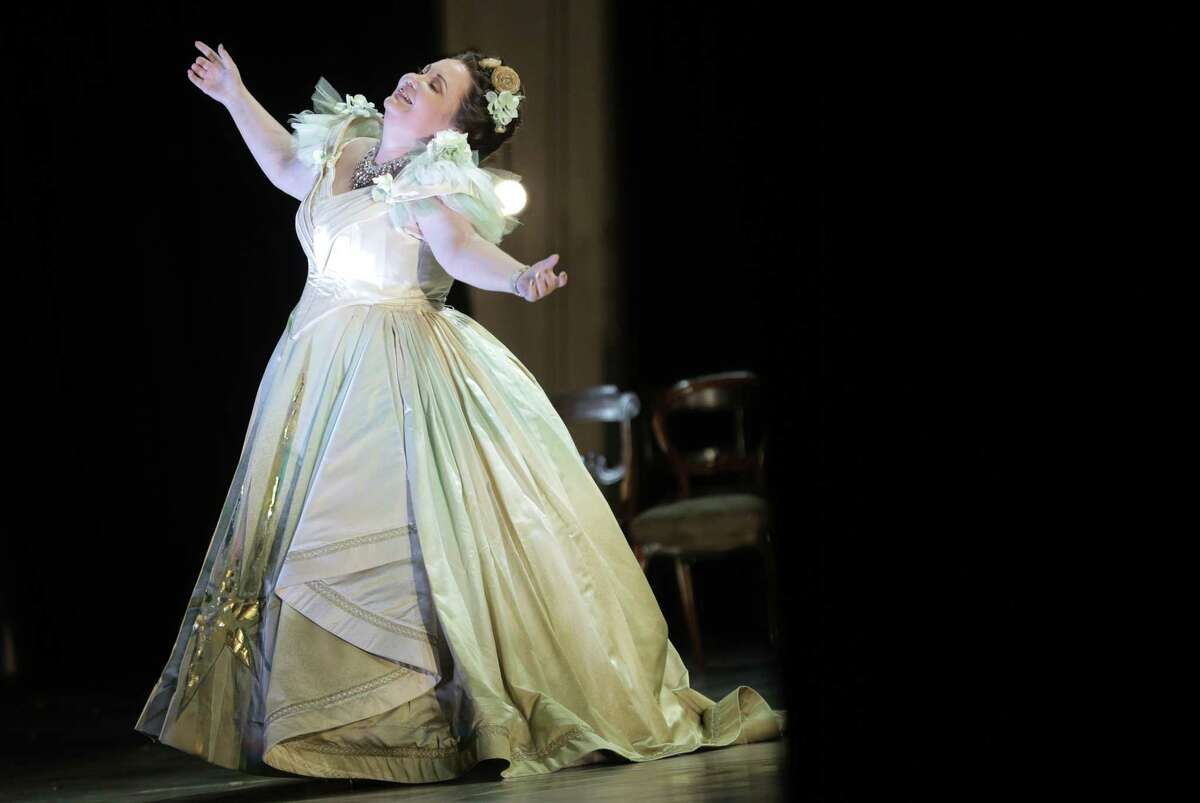 Violetta, played by Albina Sagimuratova singers during the dress rehearsal of the Houston Opera's production of La traviata on Tuesday, Oct. 17, 2017, in Houston. ( Elizabeth Conley / Houston Chronicle )