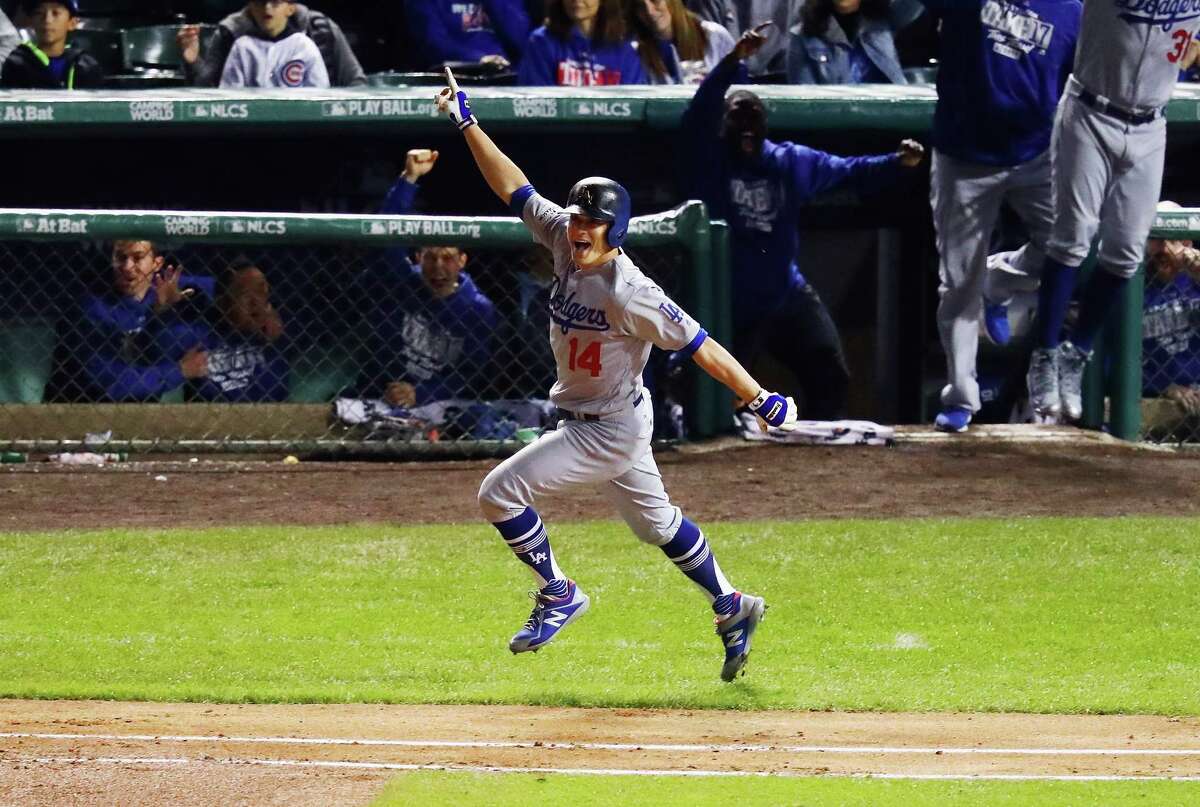 The night belonged to the Dodgers' Enrique Hernandez, who homered three times - a solo shot in the second inning, a grand slam in the third and a two-run homer in the ninth - and had seven RBIs.