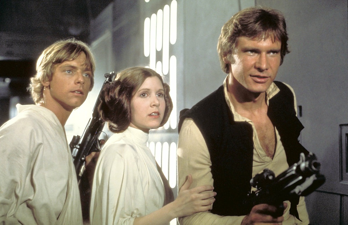 Luke Skywalker (Mark Hamill), Princess Leia (Carrie Fisher) and Han Solo (Harrison Ford) attempt to escape the clutches of Darth Vader aboard the Death Star in a scene from "A New Hope."