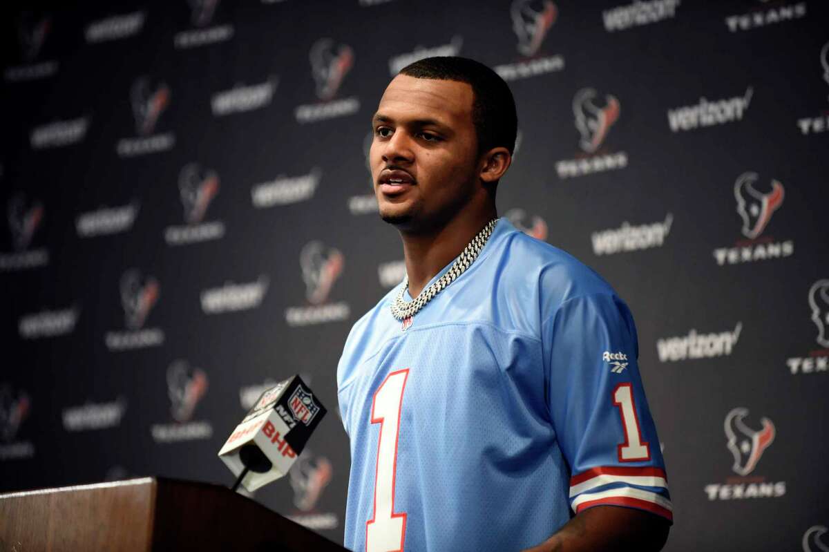 Houston Texans quarterback Deshaun Watson, wearing a Warren Moon Houston Oilers jersey, responds to a question during a news conference after after an NFL football game against the Cleveland Browns on Sunday, Oct. 15, 2017, in Houston. (AP Photo/Eric Christian Smith)