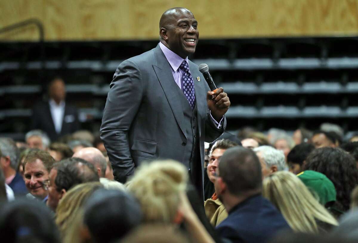 Los Angeles' Lakers' Magic Johnson discusses the "Business of Basketball" in a talk moderated by Golden State Warriors' Rick Welts at University of San Francisco War Memorial Gym in San Francisco, Calif., on Wednesday, October 18, 2017.