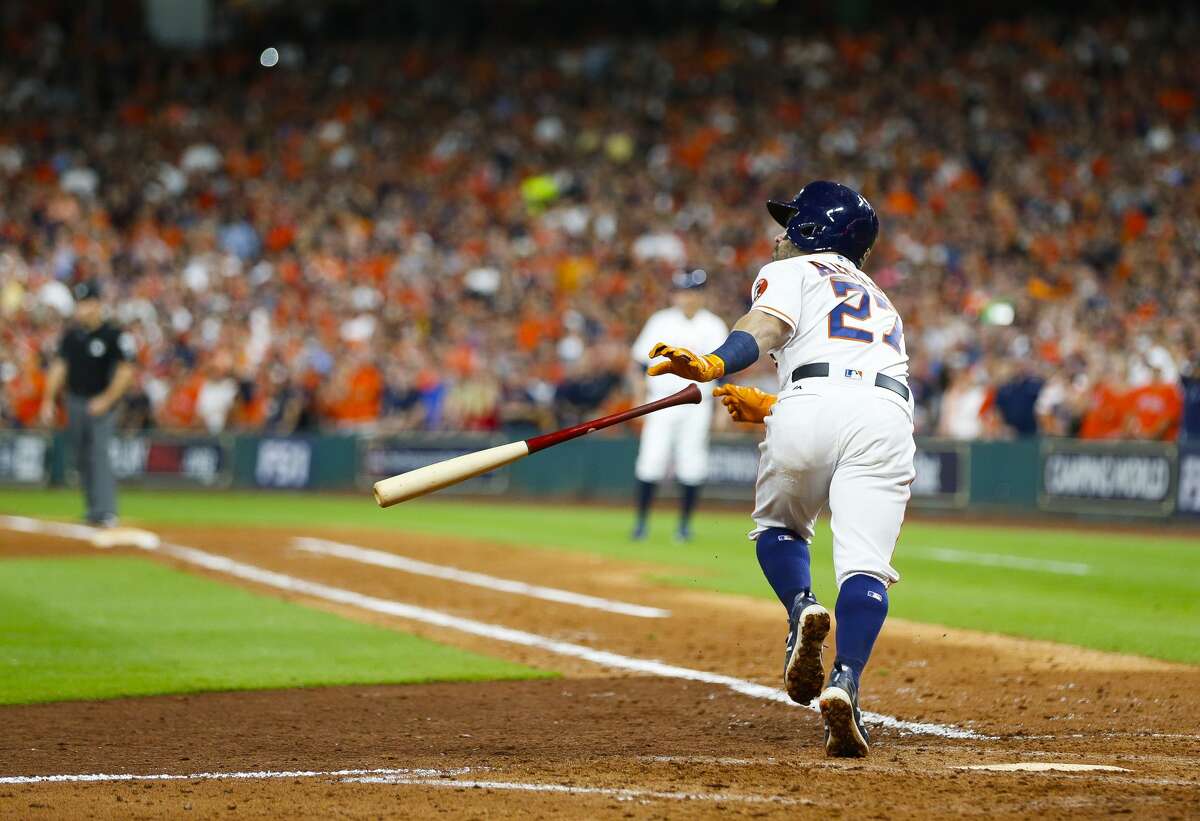 Houston Astros second baseman Jose Altuve (27) hits a home run in the eighth inning of Game 6 of the ALCS at Minute Maid Park on Friday, Oct. 20, 2017, in Houston. ( Brett Coomer / Houston Chronicle )