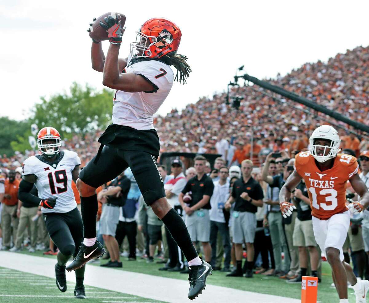 It's easy pickings for safety Ramon Richards as he clinches Oklahoma State's victory by making an interception in the end zone in overtime Saturday.