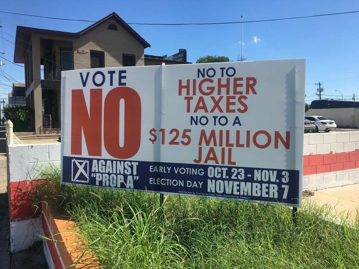 A sign opposing the proposed Webb County law enforcement facility is perched on Victoria Street.