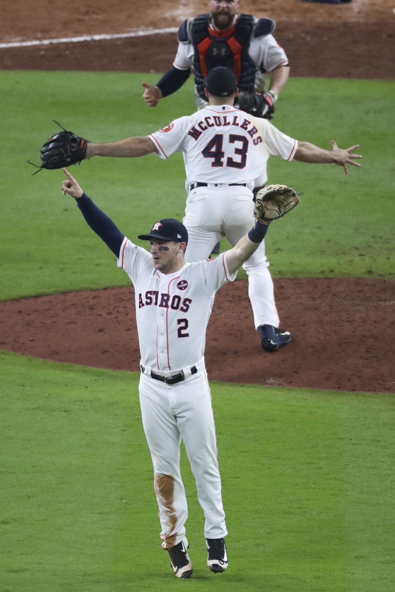 New York Yankees third baseman Todd Frazier celebrates with batter Aaron  Judge (99) after he scored when a pitch got past Houston Astros catcher Evan  Gattis in the fourth inning in game