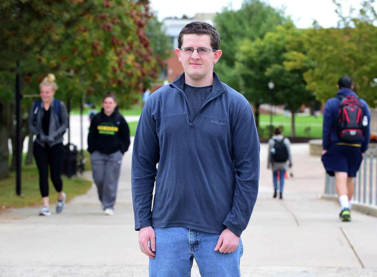 Josh Wagner, who has Becker muscular dystrophy, is photographed at Southern Connecticut State University in New Haven, where he is a senior, on Oct. 16. The FDA is deciding whether to approve an experimental drug Wagner takes.