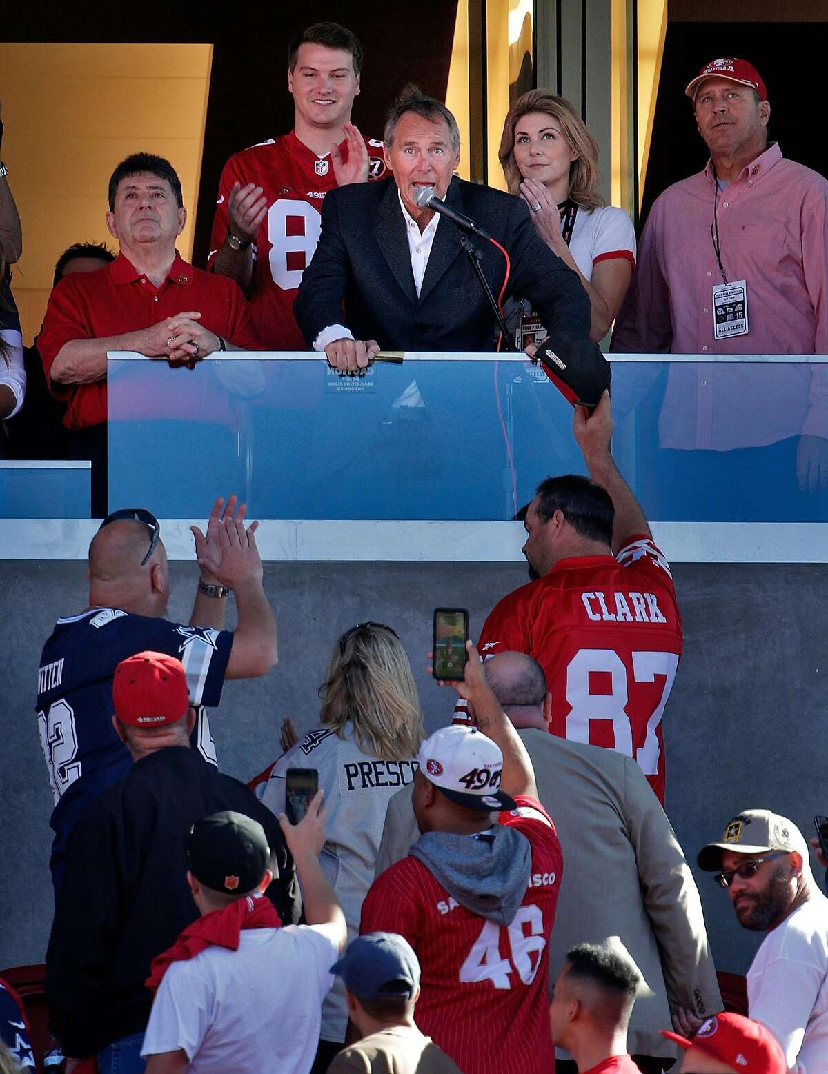 Dwight Clark speaks to the crowd during a halftime ceremony honoring Clark who recently announced he is battling ALS, as the San Francisco 49ers payed the Dallas Cowboys at Levi's Stadium in Santa Clara, Calif., Sunday, October 22, 2017.