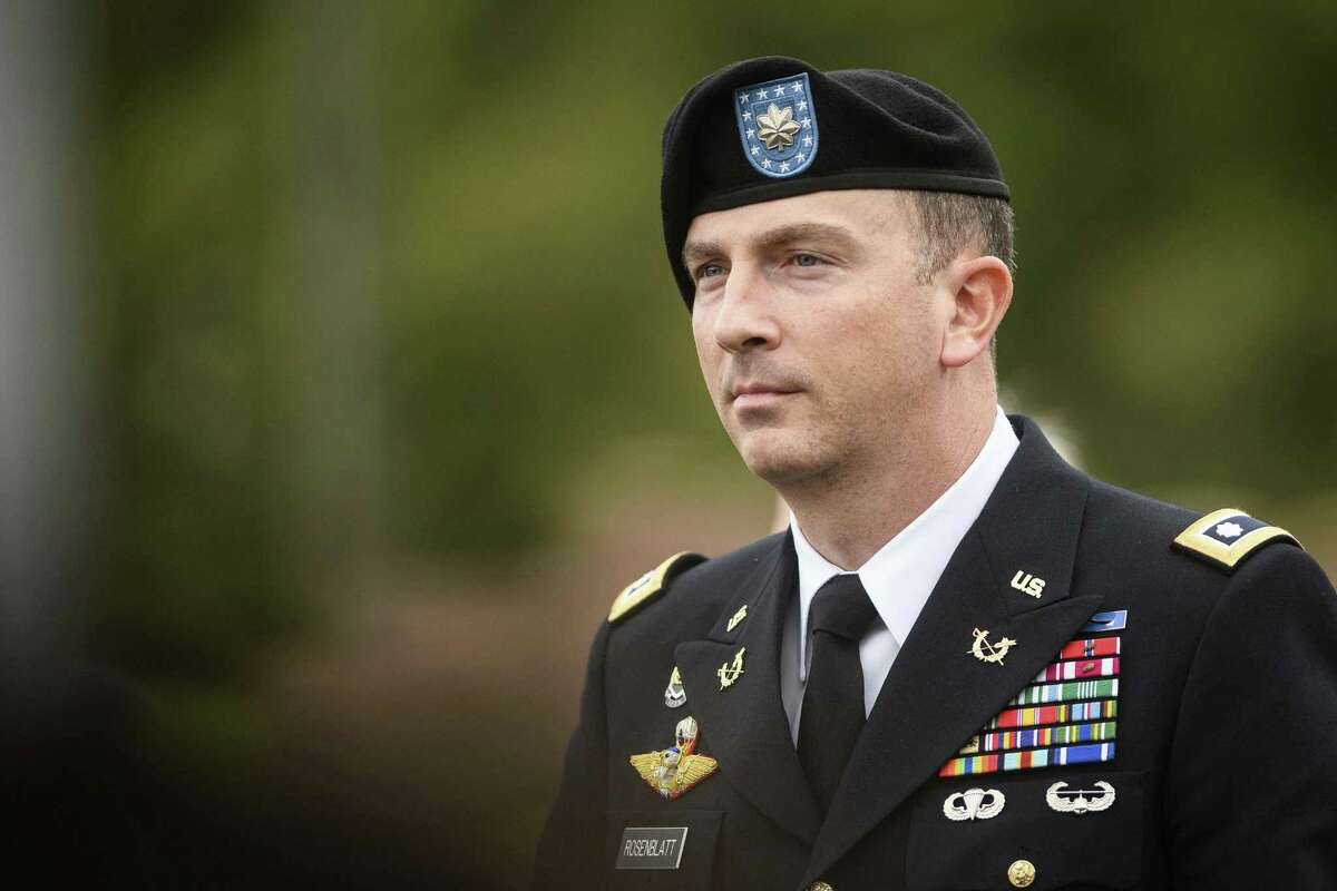 Sgt. Bowe Bergdahl's military attorney, Lt. Col. Franklin Rosenblatt, leaves the Fort Bragg courthouse after a sentencing hearing on Monday, Oct. 23, 2017, on Fort Bragg, N.C. Sentencing for Bergdahl on charges of desertion and misbehavior before the enemy was set to begin Monday, but the judge instead heard arguments about a last-minute Trump-related motion. The sentencing case is scheduled to resume on Wednesday. (Andrew Craft/The Fayetteville Observer via AP)