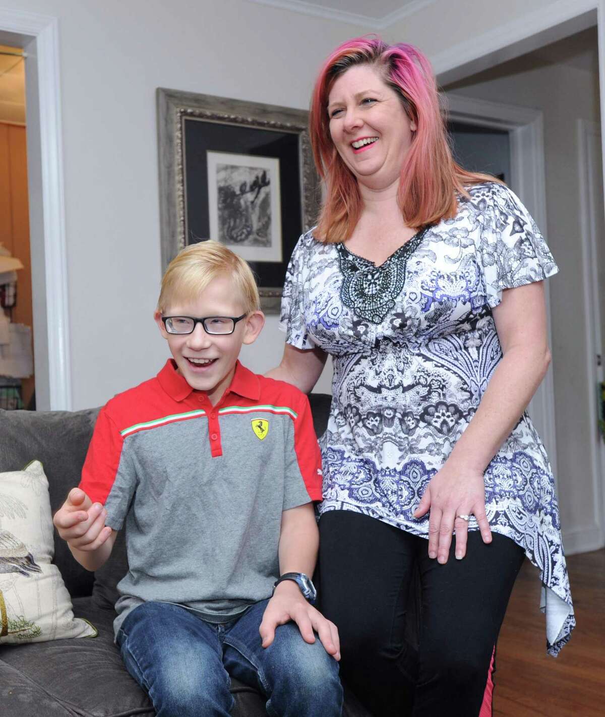 Connor O'Neill, 11, and his mom, Damara O'Neill, speak about Connor's Make-A-Wish Foundation Mediterranean cruise that he took last year at his home in Darien, Conn., Friday, Sept. 29, 2017.