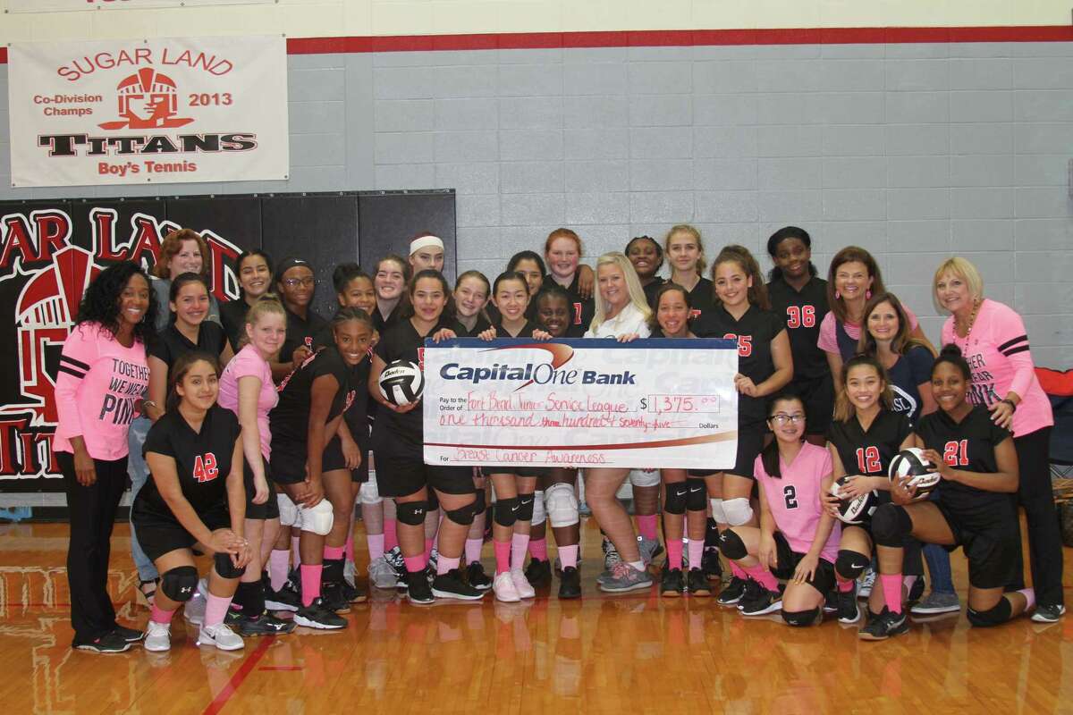The 7th and 8th Grade Girls' Volleyball Teams at Sugar Land Middle School recently collected donations from their friends, families, and teachers in recognition of Breast Cancer Awareness Month.  The funds were pooled to make a donation to the Fort Bend Junior Service League's (FBJSL) Breast Cancer Fund.