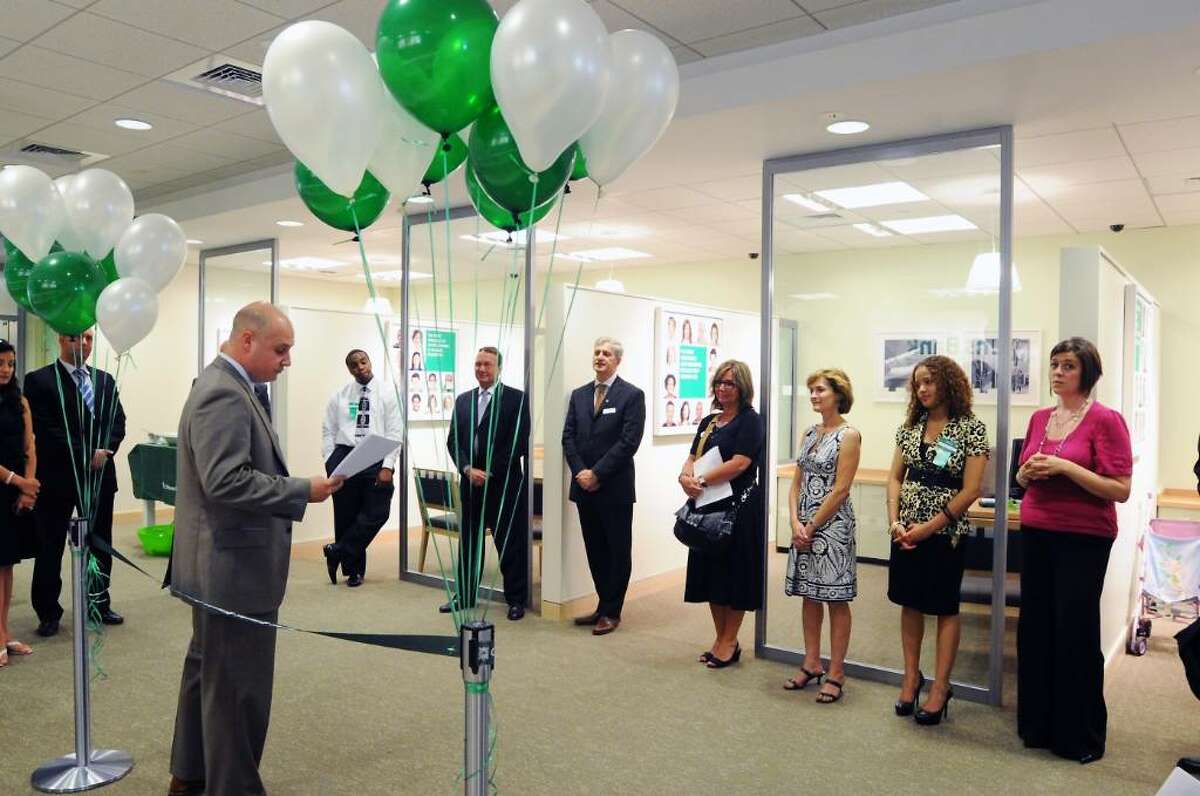Brandon Ojakian, branch manager, addresses the group as Citizens Bank, the RBS retail bank in the US, opens its first branch for the public at One Atlantic Street in its headquarters city of Stamford, Conn. on Friday June 25, 2010.