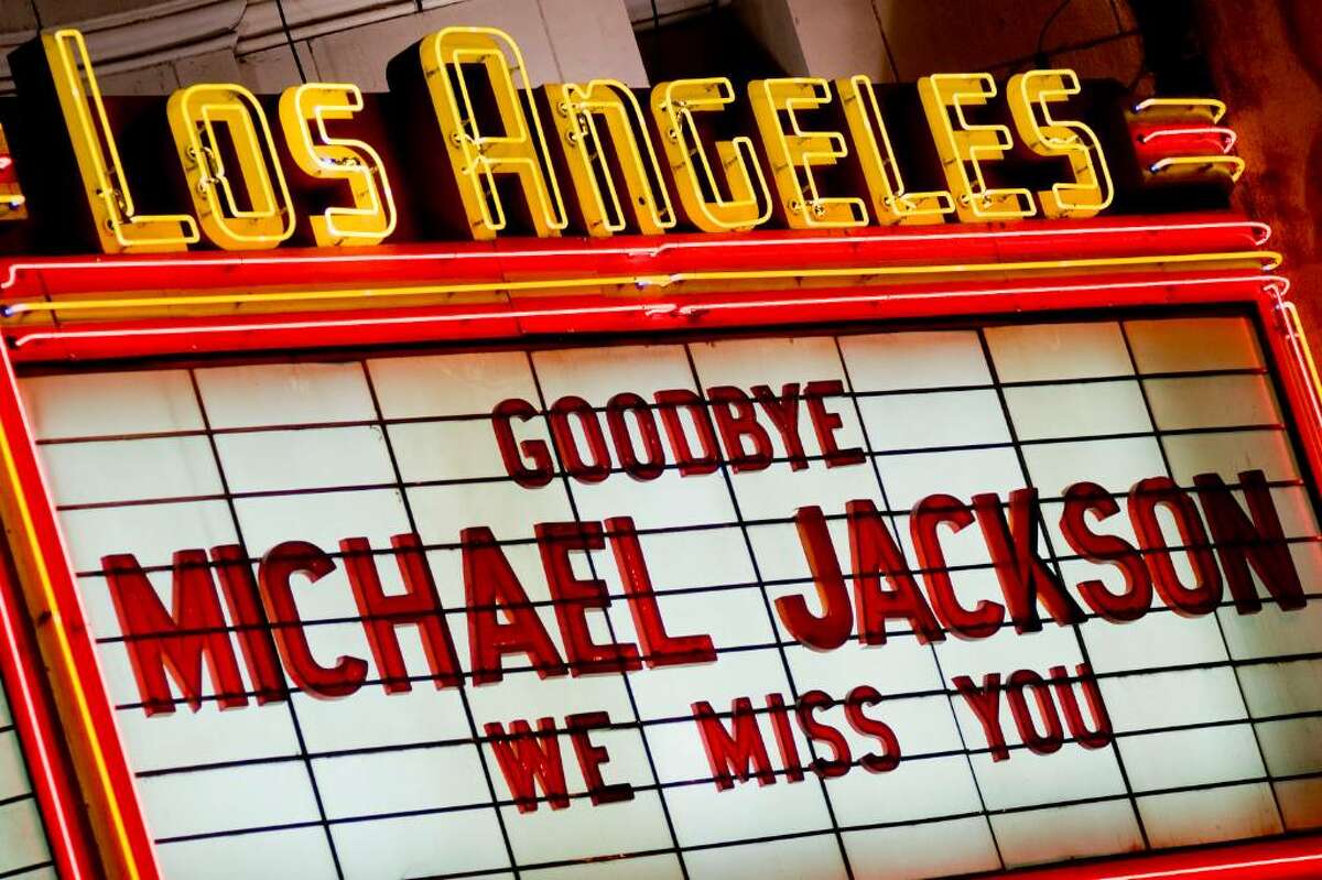 LOS ANGELES - JUNE 27: The Los Angeles Theater Marquee honours Michael Jackson on June 27, 2009 in Los Angeles, California. Jackson, 50, the iconic pop star, died after going into cardiac arrest on June 25, 2009 in Los Angeles, California. (Photo by Michal Czerwonka/Getty Images)