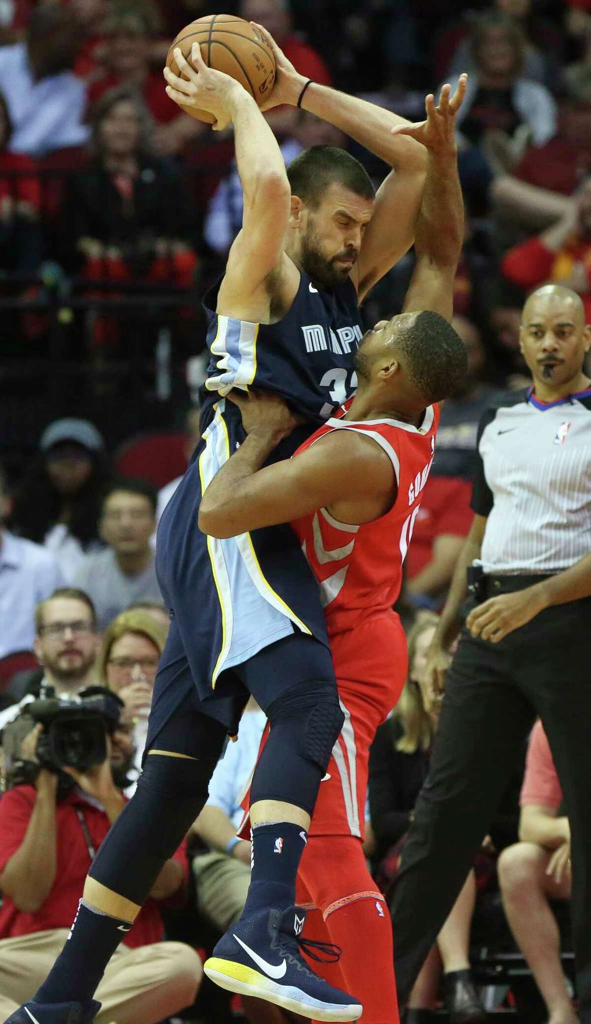 Memphis Grizzlies center Marc Gasol (33) cannot move toward the basket while being defensed by Houston Rockets guard Eric Gordon (10) during the second quarter of the NBA game at Toyota Center Monday, Oct. 23, 2017, in Houston.