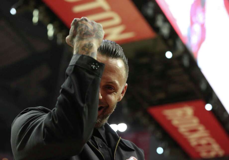 october front singer justin furstenfeld hugs houston rockets