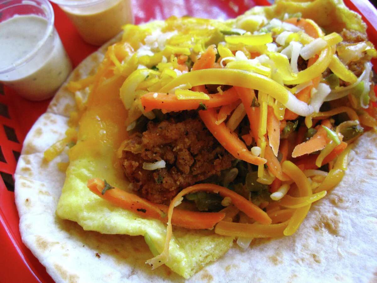 The Dirty Sanchez breakfast taco at Torchy’s Tacos with a fried poblano pepper, eggs, cheese and carrot escabeche on a flour tortilla. Torchy’s Tacos will open a third San Antonio location on the North Side in the Sonterra neighborhood.