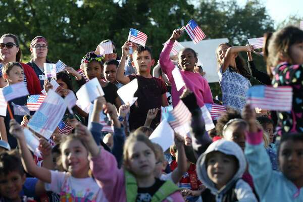 New arrivals show pride of origin in San Antonio school parade ...