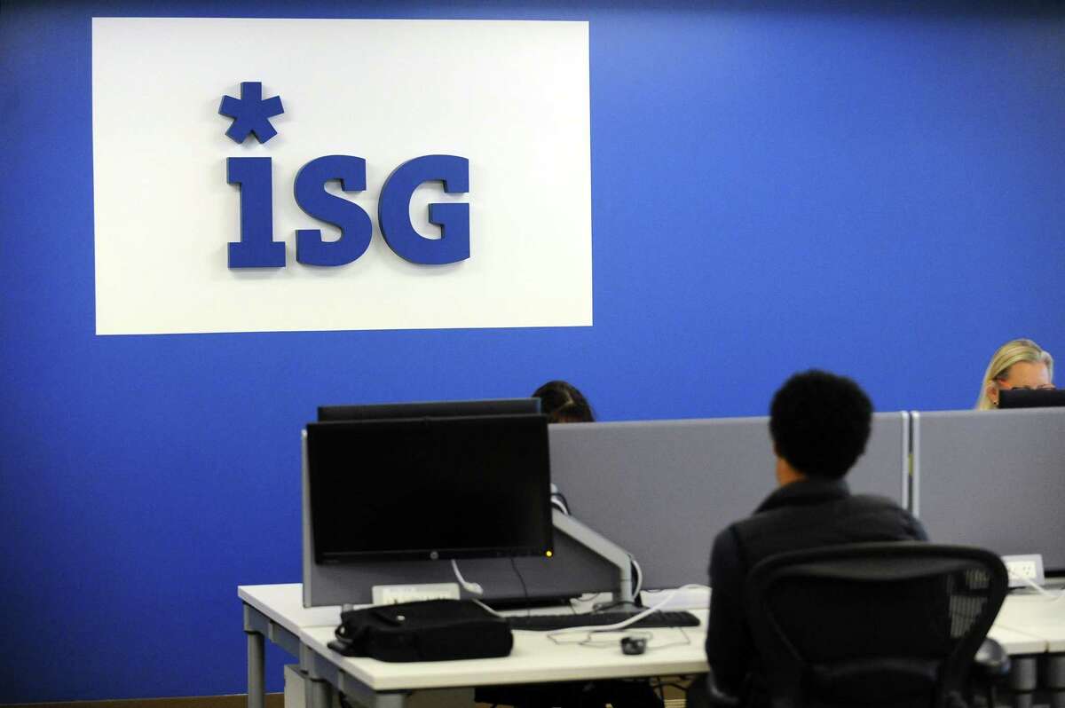 Employees of the technology research and advisory firm ISG work in the firm’s Tresser Boulevard offices in downtown Stamford, Conn., on Tuesday, Oct. 24, 2017. ISG has announced it will relocate its Stamford headquarters from 281 Tresser Blvd., to 2187 Atlantic St., in the South End of Stamford.