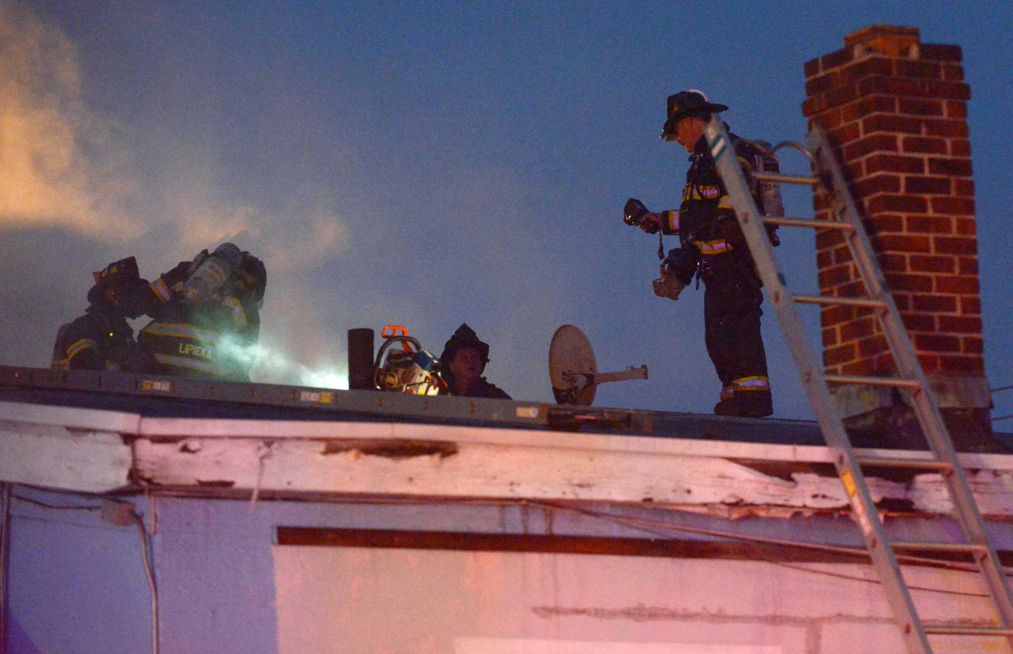 Firefighters Douse Blaze At Boat Yard On Harbor