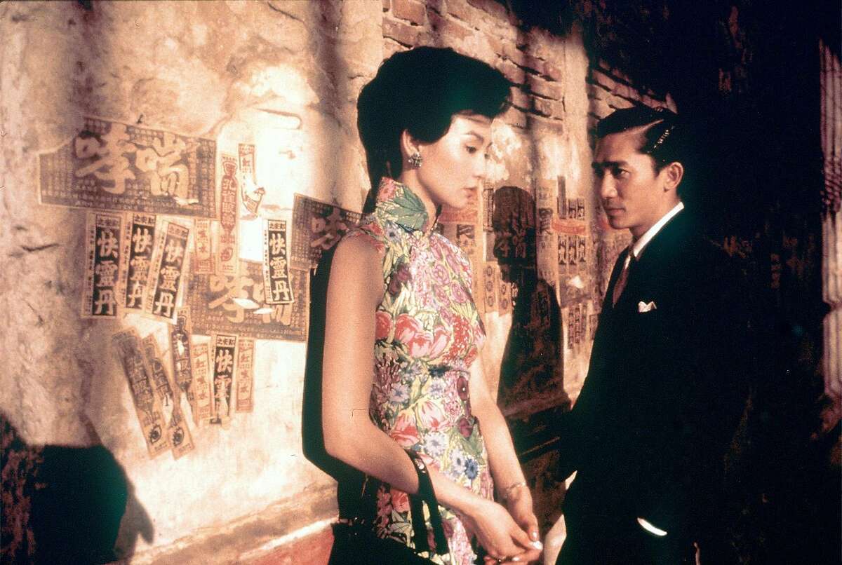 LOVE16-C-13FEB01-DD-HO Maggie Cheung and Tony Leung Movie still from, "In the Mood for Love." Ran on: 07-18-2005 Maggie Cheung in In the Mood for Love Ran on: 07-18-2005 Maggie Cheung in In the Mood for Love