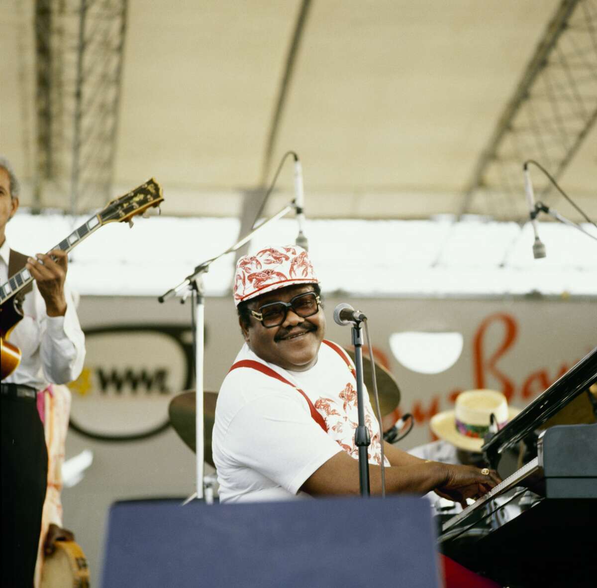 Fats Domino performs on stage at the New Orleans Jazz and Heritage Festival in New Orleans, Louisiana on April 25, 1993. (Photo by David Redfern/Redferns)