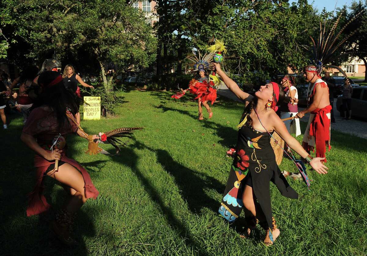Members of Danza Azteca Taxca Yoloztl perform traditional dance.