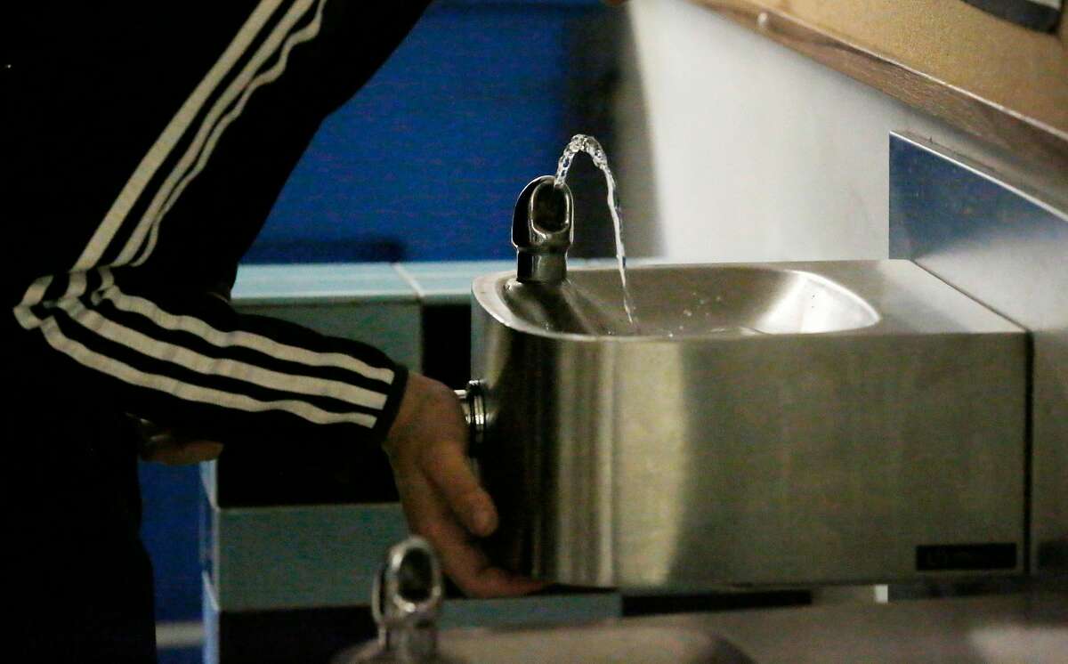 A student uses a water fountain that was cleared for use at San Francisco International High School� on Wednesday, October 25, 2017 in San Francisco, Calif.