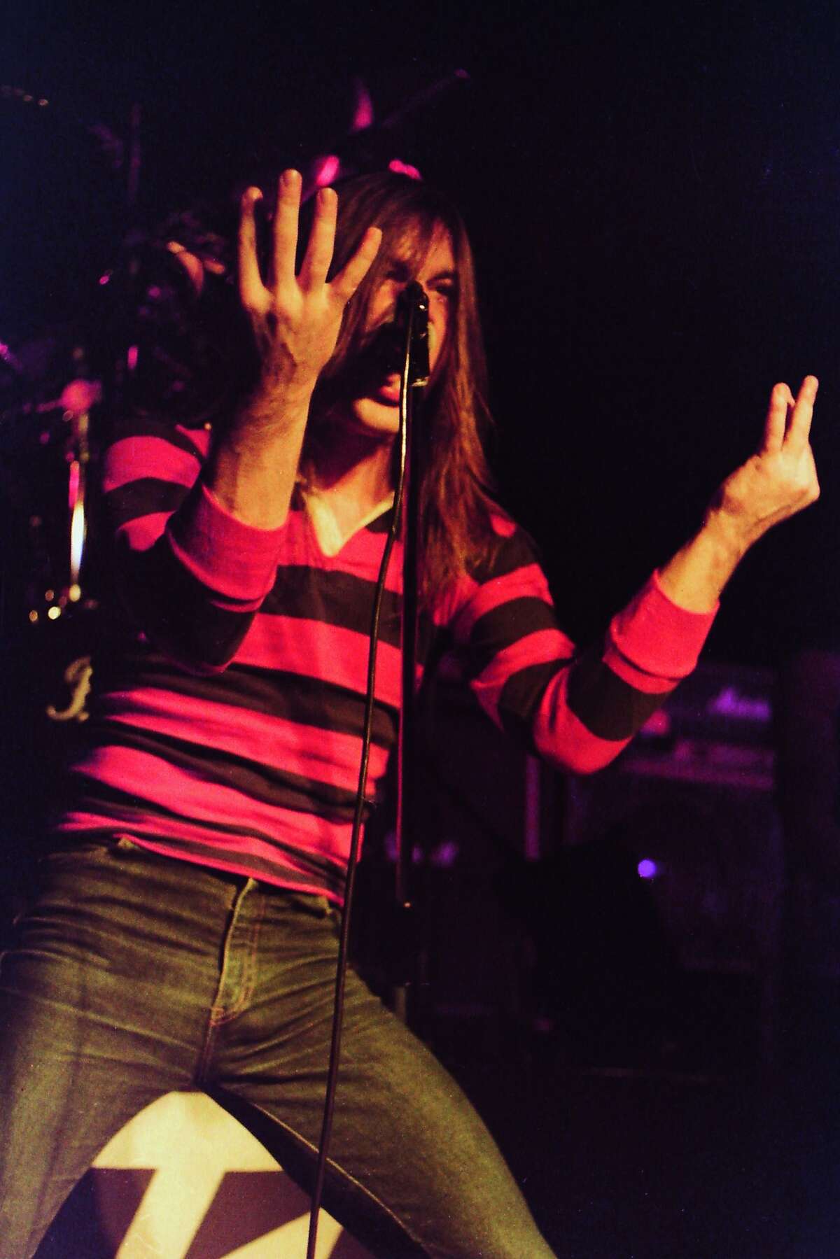 Long hair, stripes and jeans -- one uniform for heavy metal singers - as seen on Bruce Dickinson, who sang for Shots, Speed and Samson before joining Iron Maiden in the early 1980s. He's had a three-decade career with the band that included a short separation for several solo albums.