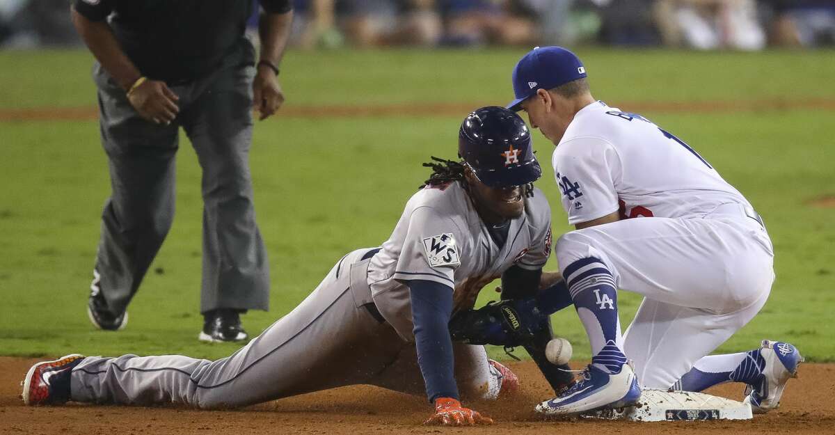 Cameron Maybin steals second during the eleventh inning of Game 2 of the World Series at Dodger Stadium on Wednesday, Oct. 25, 2017, in Los Angeles. ( Michael Ciaglo / Houston Chronicle )