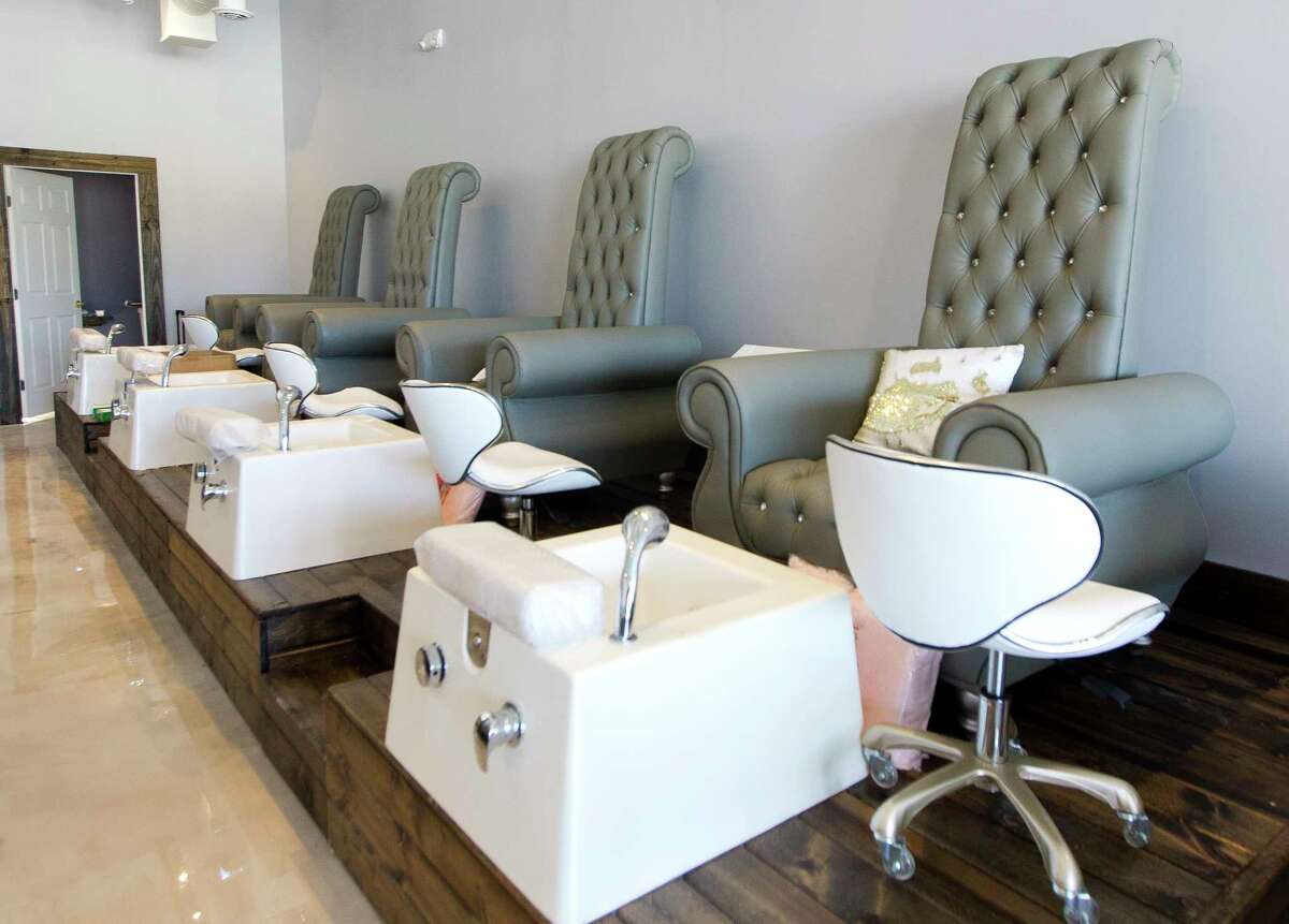 Martinis & Manicures is seen as items are moved into place prior to the business' grand opening on Oct. 21.