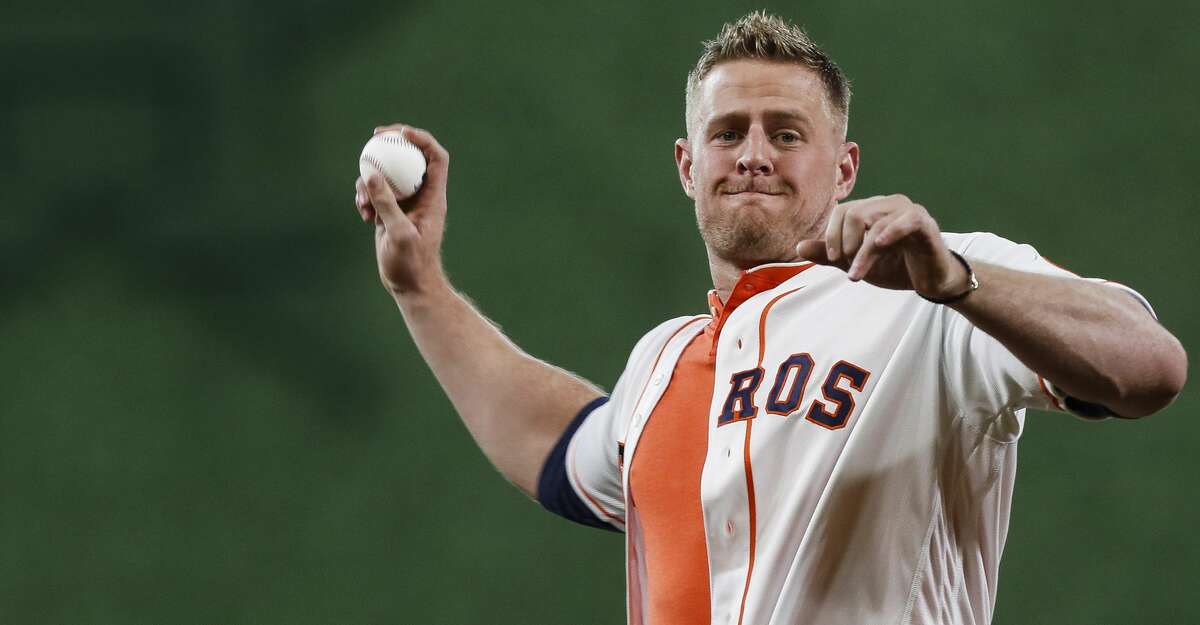 Houston Texans defensive end J.J. Watt throws out the first pitch before  the Los Angeles Dodgers-Houston Astros in the 2017 MLB World Series game  three at Minute Maid Park in Houston, Texas