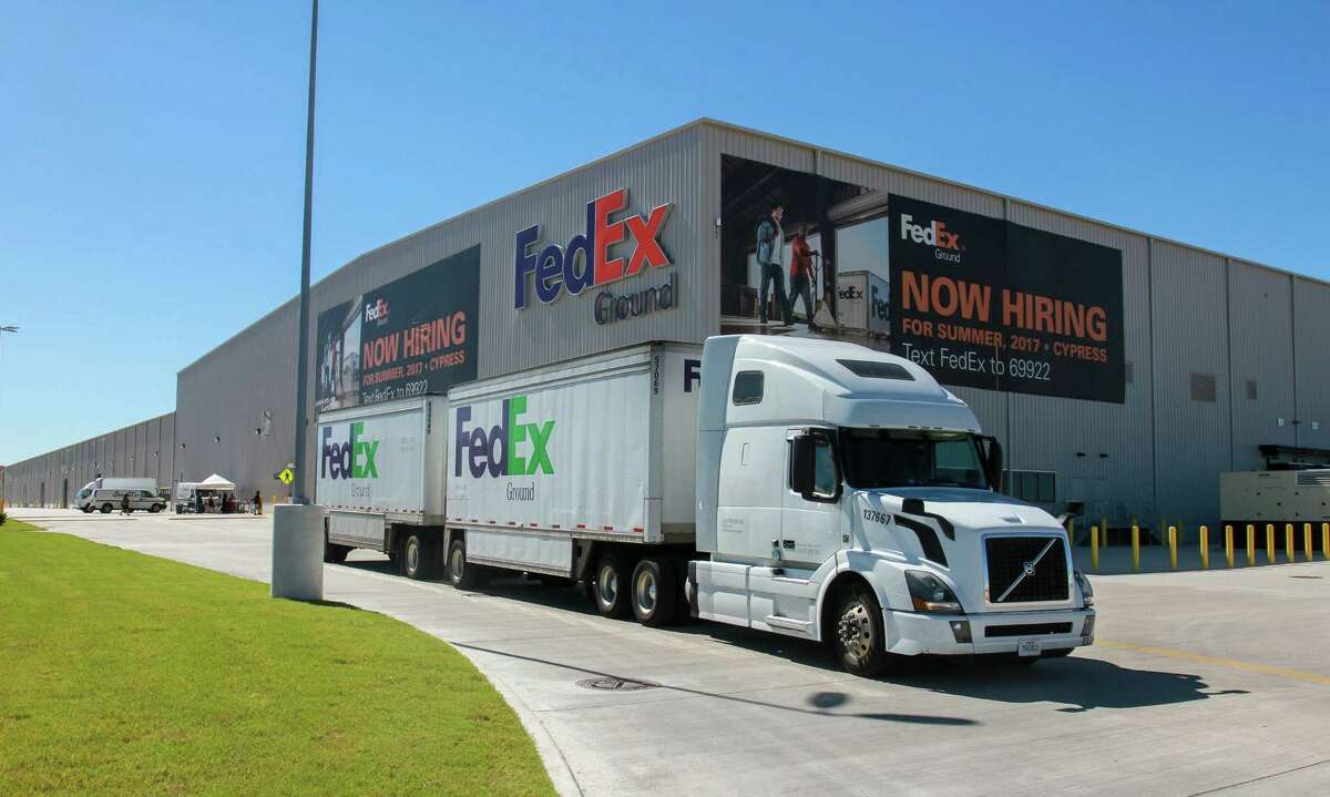 A FedEx truck leaving the new FedEx Ground 800,000-square-foot automated distribution hub in Houston. (For the Chronicle/Gary Fountain, October 26, 2017