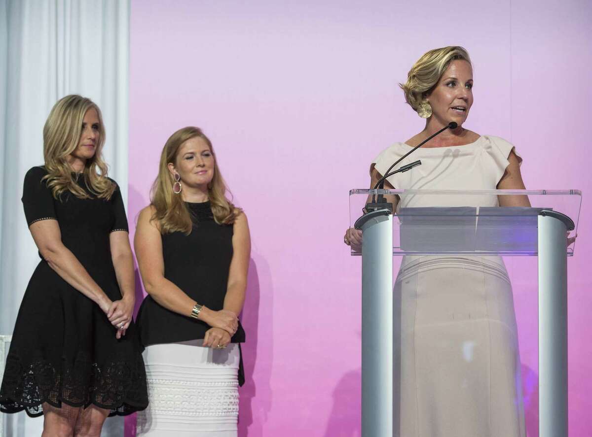 Co-chairwomen of the Breast Cancer Alliance, from left, Gretchen Bylow, Jordan Rhodes and Hillary Corbin, speak at the alliance’s annual luncheon and fashion show Thursday at the Hyatt Regency in Old Greenwich.