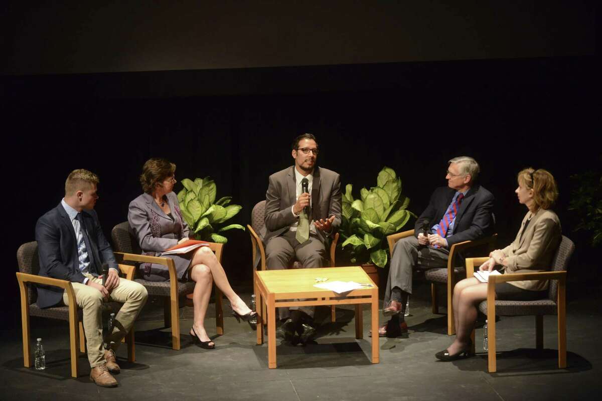 Peer counselor at Rise Recovery Josh Green (from left); Colleen Bridger, director of the San Antonio Metropolitan Health District; Dr. Timothy Grigsby, assistant professor of community health at UTSA; Bryan Alsip, chief medical officer of University Health System; and moderator Francine Romero participate in “The Opioid Crisis” town hall meeting Thursday at the UTSA downtown campus.