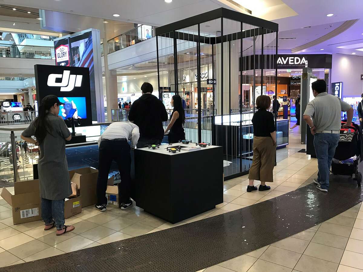 Store employees on Friday set up drone maker DJI's second San Francisco store, in the Westfield San Francisco Centre mall, to prepare for Saturday's grand opening.