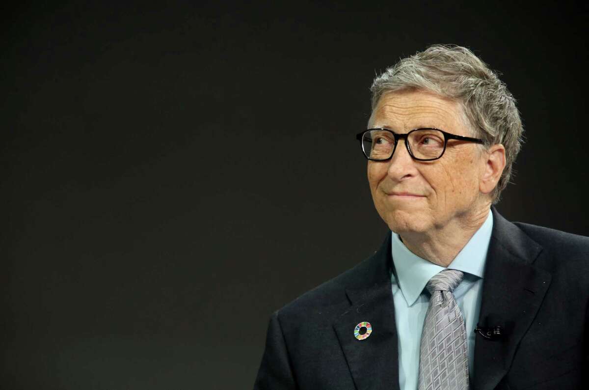 FILE-- Bill Gates listens to former U.S. President Barack Obama answer questions at the Gates Foundation Inaugural Goalkeepers event on September 20, 2017 in New York City. The three wealthiest people in the United States — Microsoft co-founder Bill Gates, Amazon founder Jeff Bezos, and Berkshire Hathaway CEO Warren Buffett — now own more wealth than the entire bottom half of the American population combined, roughly 160 million people.