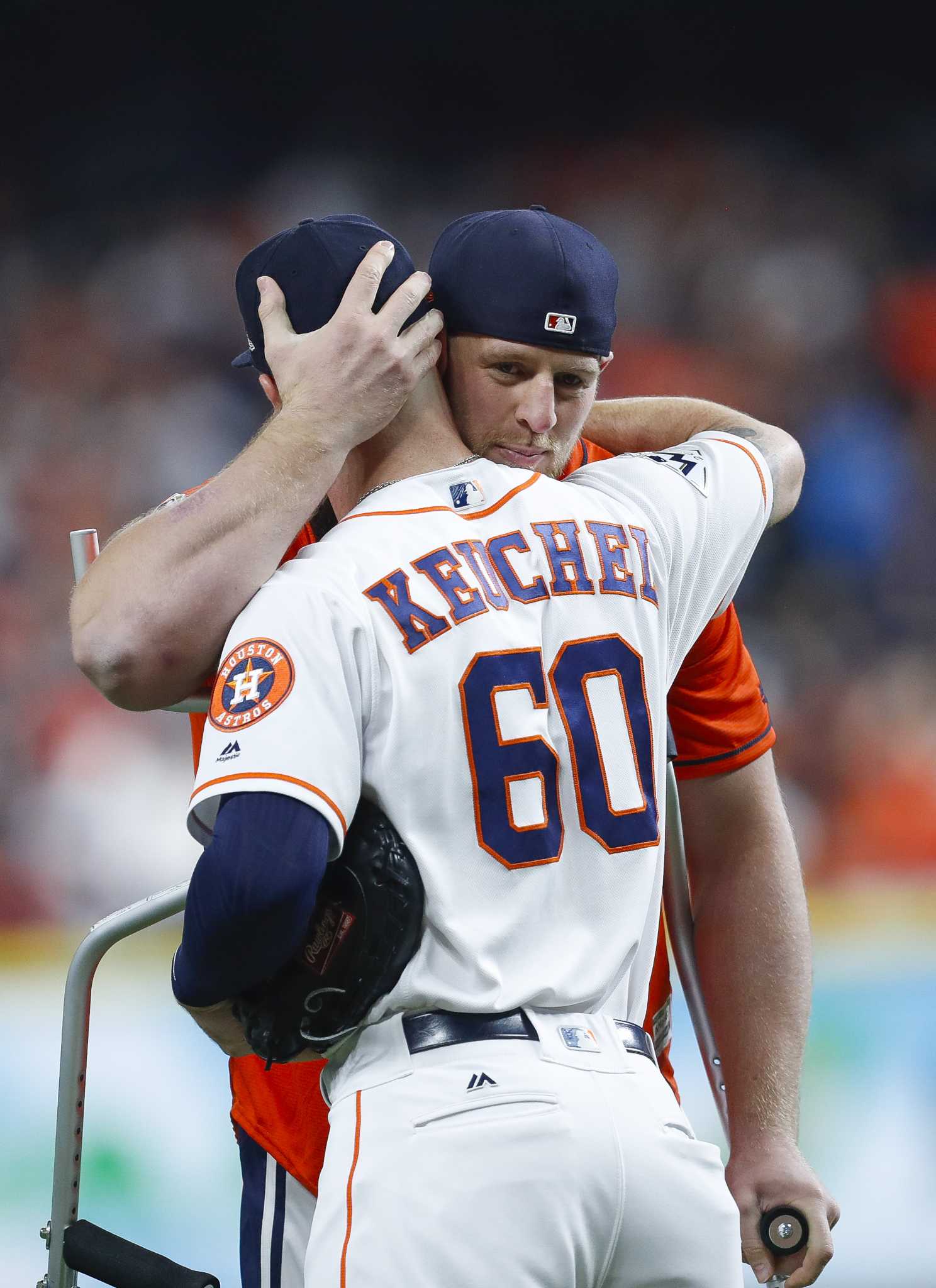 Houston Texans defensive end J.J. Watt throws out the first pitch before  the Los Angeles Dodgers-Houston Astros in the 2017 MLB World Series game  three at Minute Maid Park in Houston, Texas