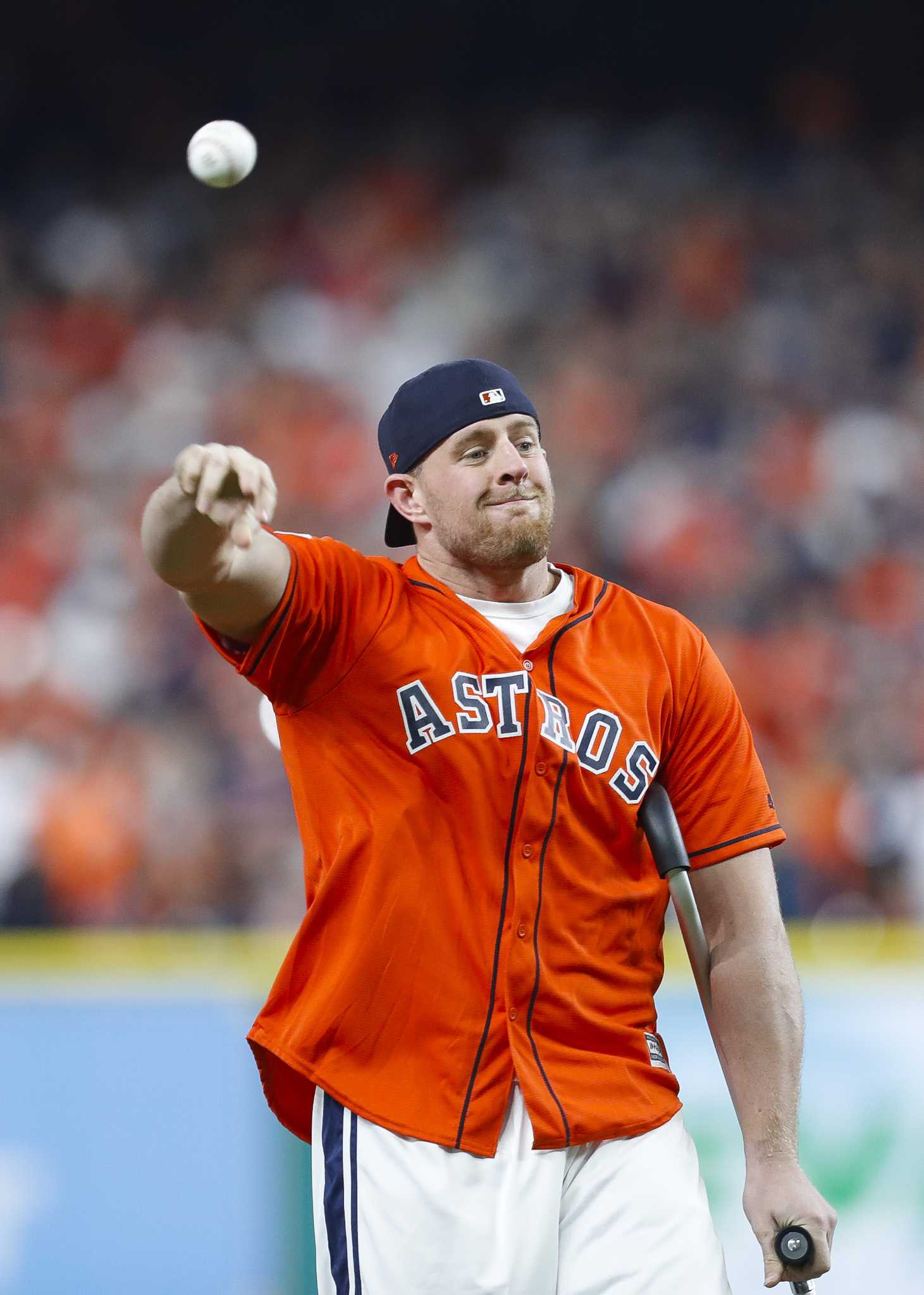 J.J. Watt of Houston Texans tosses first pitch at Game 3 of World