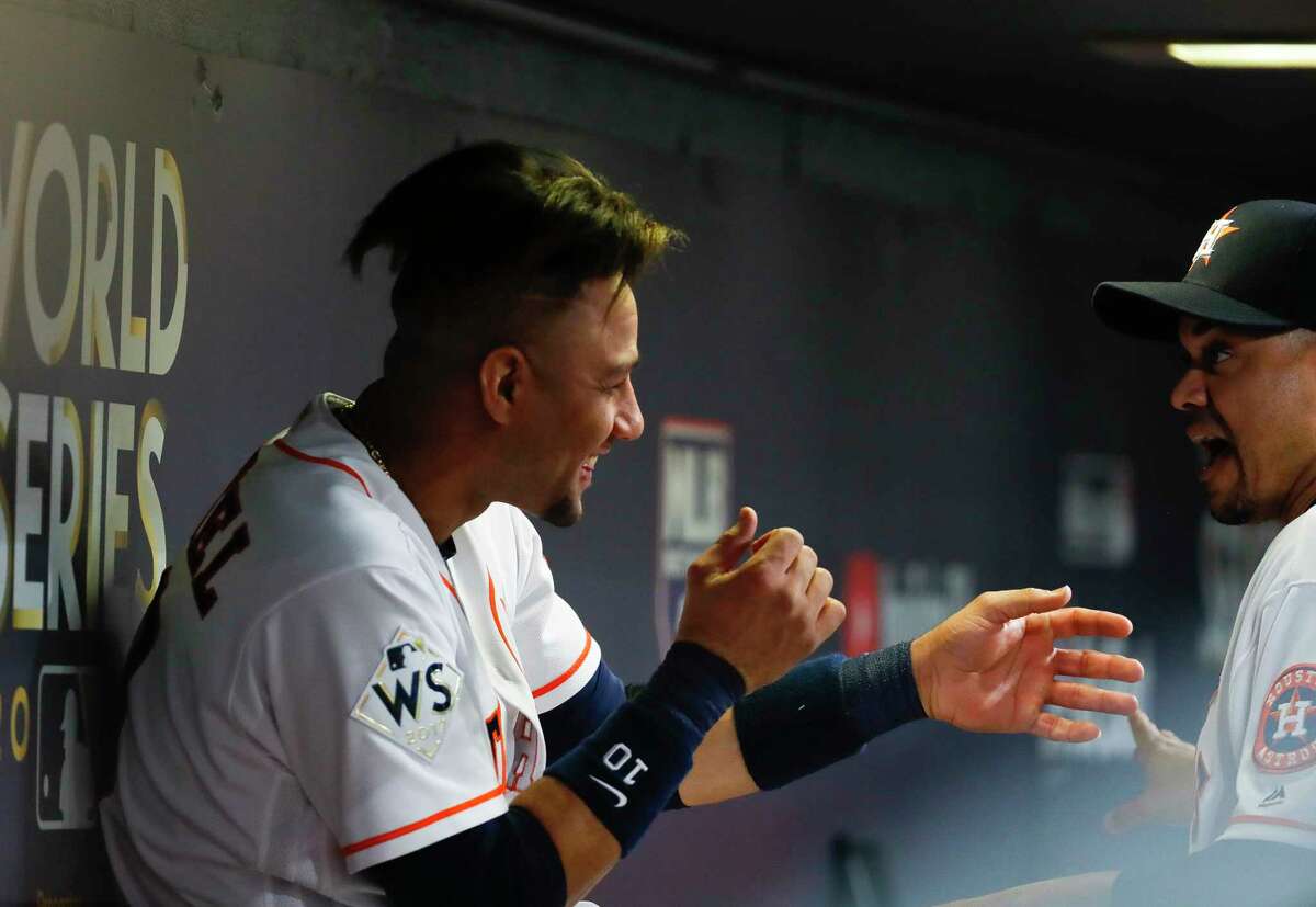 Houston Astros first baseman Yuli Gurriel (10) laughs in the dugout during the second inning of Game 3 of the World Series at Minute Maid Park on Friday, Oct. 27, 2017, in Houston.