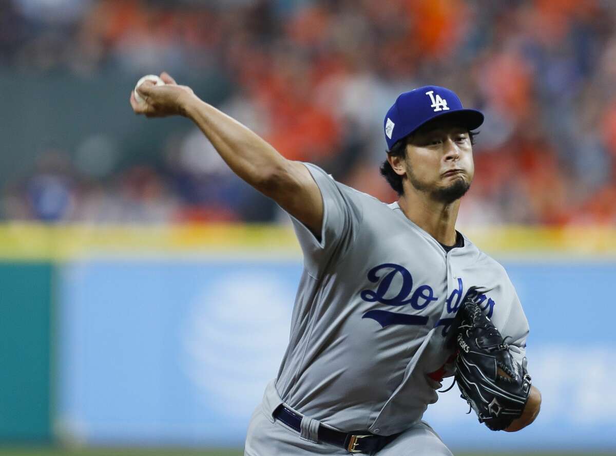 Los Angeles Dodgers starting pitcher Yu Darvish (21) pitches during the first inning of Game 3 of the World Series at Minute Maid Park on Friday, Oct. 27, 2017, in Houston.