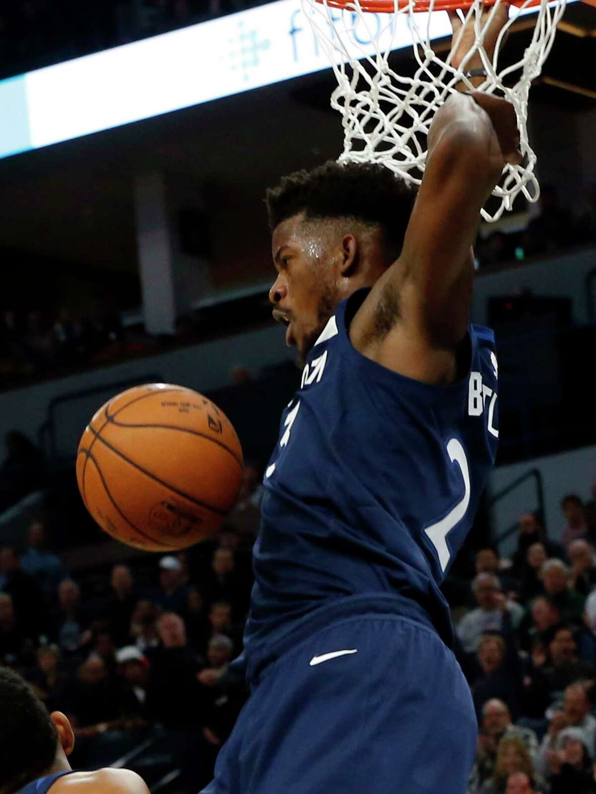 Minnesota Timberwolves' Jimmy Butler dunks against the Oklahoma City Thunder during the first half of an NBA basketball game Friday, Oct. 27, 2017, in Minneapolis. (AP Photo/Jim Mone) ORG XMIT: MNJM106